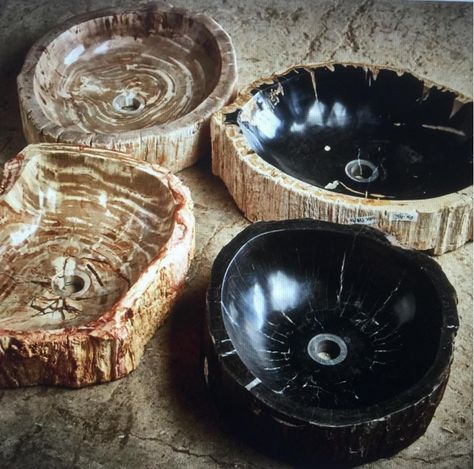 The demand for unique and luxurious products has been on the rise among homeowners, leading to an increasing trend in incorporating organic elements into interior decor. Petrified wood sinks have become a standout feature in luxury homes, especially in bathrooms and kitchens. The undulated finish and natural edge of wood fossils create a handmade look that adds a touch of nature to any room. Homeowners who value timeless and handcrafted items are particularly drawn to these products. Wood Sink Vanity, Rustic Bathroom Design, Wooden Sink, Petrified Wood Sink, Sink Bowl, Fossilized Wood, Wood Sink, Bathroom Oasis, Organic Elements