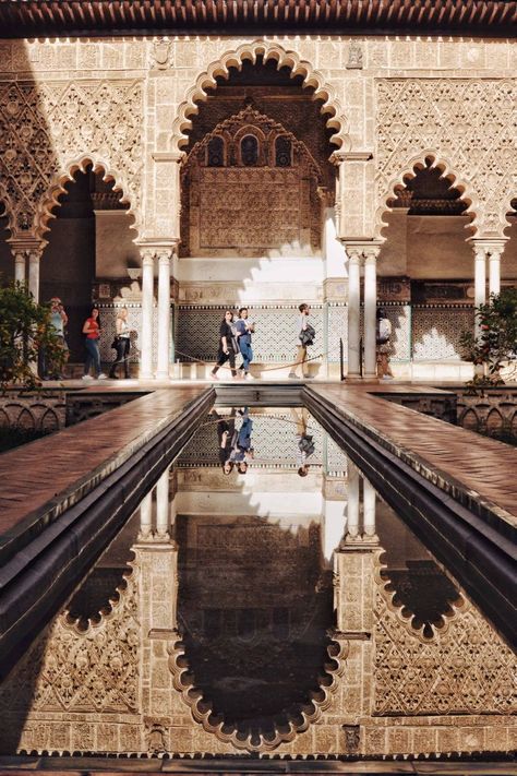 A Picture of the Patio of the Real Alcazar of Sevilla (Royal Alcazar of Seville) showing the Mudejar style of architecture prevalent in Spain where game of thrones was shot! Blog post is linked with more photos of the alcazar gardens. Seville Photoshoot, Sevilla Photo Ideas, Sevilla Architecture, Seville Photography, Beautiful Palace, Alcazar Seville, Andalusia Spain, Seville Spain, Spain And Portugal