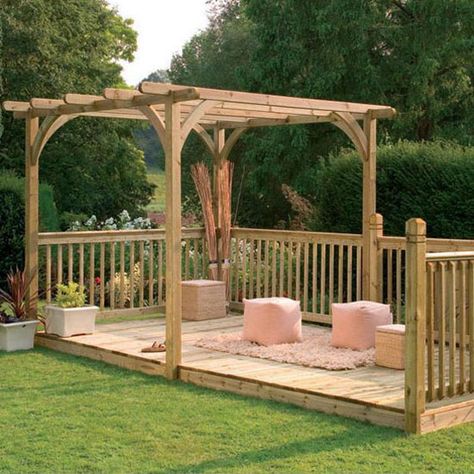 Try a freestanding kit such as this one and create a secluded, multifunctional area at the bottom of your garden. The inclusion of a pergola will give your garden structure and another focal point, while providing support for climbing plants and an attractive canopy to sit under when the plants are in flower. Floating Deck Plans, Freestanding Deck, Garden Decking, White Pergola, Pergola Diy, Floating Deck, Decking Area, Patio Pergola, Wooden Gazebo