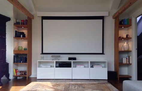 Roll Down Projector Screen, Projection Screen Living Room, Hide Projector Screen, Screen Projector Ideas, Living Room Projector Wall, Hidden Projector Screen, Projector Screen Living Room, Projector Ideas, Projector Wall