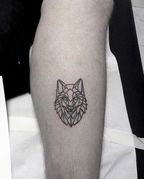 Geometric wolf head tattoo on the calf Mini Wolf Tattoo, Wolf Head Tattoo, Wolf Face Tattoo, Husky Tattoo, Geometric Wolf Tattoo, Small Wolf Tattoo, Zelda Tattoo, Forearm Band Tattoos, Geometric Wolf