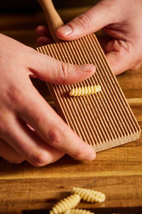 Bring the heart of Italy into your kitchen with the simple joy of making Gnocchetti Sardi at home. This beautifully crafted gnocchi board is your key to creating these delightful ridged pastas, perfect for catching every ounce of sauce. Gnocchi Board, Italian Market, Handmade Pasta, Samurai Helmet, Gnocchi, Home Kitchen, At Home, Sauce, Pasta