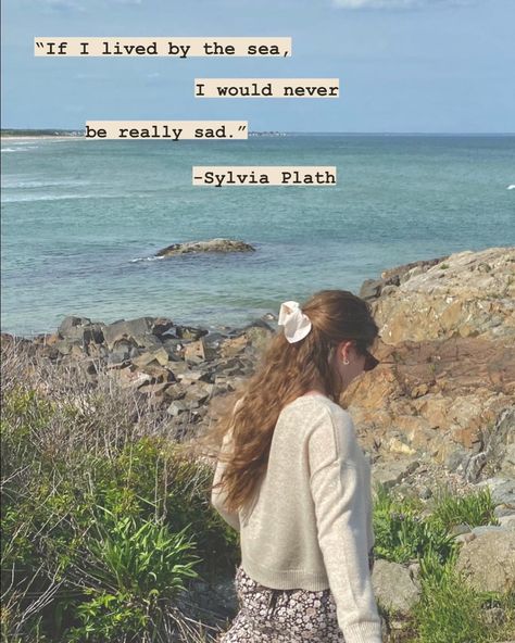 girl with long brown hair with hair ribbon in a beige sweater and floral skirt walks along a rocky shore next to the sea with a sylvia plath quote about the ocean above her Beach Life Aesthetic House, Light Blue Academia Aesthetic, By The Sea Aesthetic, Living By The Sea, Coastal Cottagecore Aesthetic, Coastal Granddaughter Quotes, Sea Academia Aesthetic, Shore Aesthetic, By The Sea