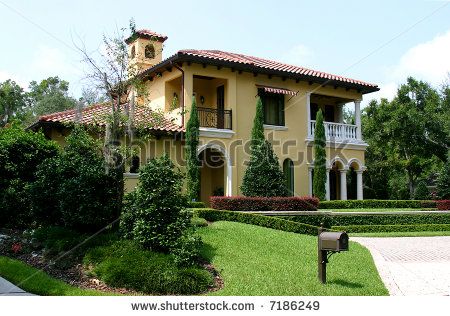 High-end Spanish style home. PHOTO ID: House00021 by Tom Fawls, via ShutterStock Spanish Exterior Paint Colors, Spanish Style Homes Exterior, Spanish Style Bathrooms Mexico, Spanish Style Home Exterior, Spanish Style Exterior, Spanish Mediterranean Homes, Spanish Style Architecture, Tuscan Style Homes, Homes Exterior