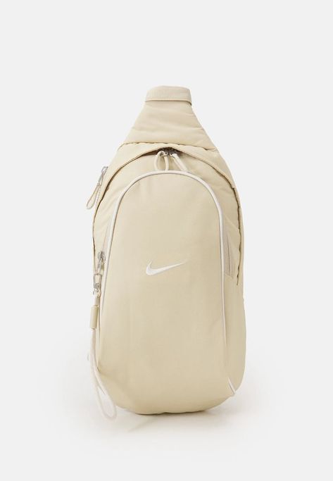 https://www.zalando.co.uk/nike-sportswear-essentials-sling-bag-unisex-across-body-bag-phantom-ni154h05f-a11.html Adidas Sling Bag, Nike Sling Bag, Sling Bag Aesthetic, Canvas Sling Bag, Nike A, Look Festival, Nike Bags, Sling Pack, Bags Aesthetic