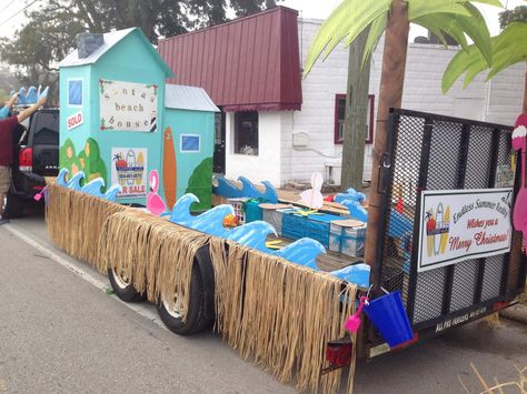 Santa’s Beach House Christmas parade float Endless Summer Realty- Saint Augustine Florida #realestate #paradefloat #cardboard Summer Themed Parade Floats, Beach Christmas Parade Float, Tropical Float Parade, Tropical Parade Float Ideas, Beach Themed Parade Float, Tropical Christmas Parade Float, Realtor Parade Float Ideas, Beach Theme Parade Float Ideas, Beach Parade Float Ideas