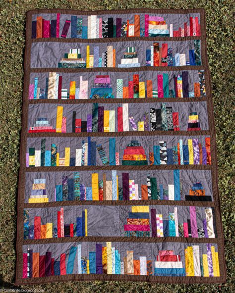 One Dozen Book Quilts and Bookish Quilted Projects Bookshelf Quilt Ideas, Book Nook Quilt, Bookshelf Quilt Pattern Free, Book Quilts, Bookshelf Quilt, Bookcase Quilt, Quilt Pattern Free, Quilted Projects, Kindergarten Coloring Pages