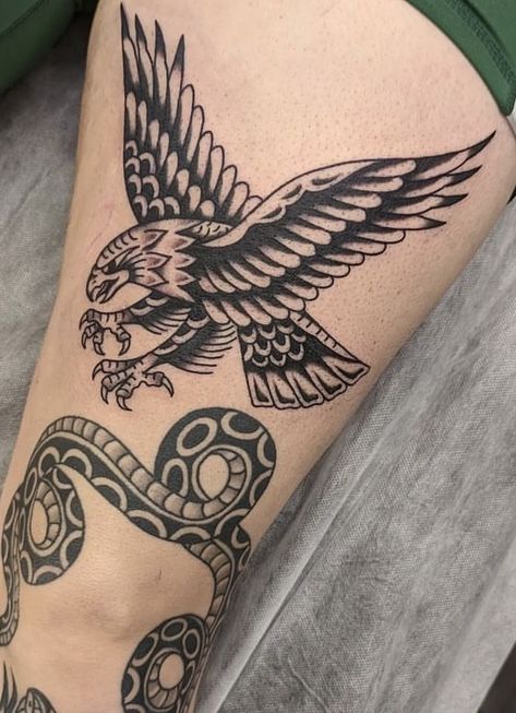 Eagle Tattoo Thigh, American Traditional Animal Tattoo, Eagle Thigh Tattoo, Eagle Vs Snake Tattoo Traditional, Sailor Jerry Eagle Tattoo, Traditional Eagle With Flowers Tattoo, Traditional Eagle Flash, Snake And Eagle Traditional Tattoo, Vintage Eagle Tattoo Flash