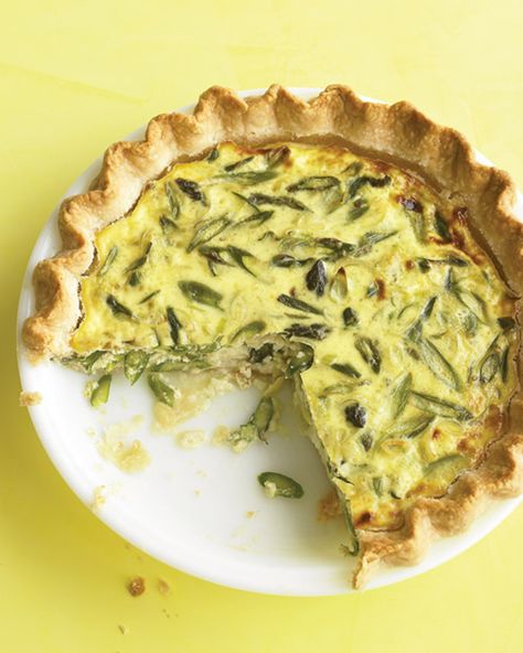 Asparagus, Leek, and Gruyere Quiche | Martha Stewart - This spring dish is made richer with Gruyere -- an aged Swiss cheese with a nutty flavor that tastes great with eggs. #gruyererecipe #asparagusrecipe #quicherecipe Gruyere Quiche, Crab Quiche, Best Quiche Recipes, Leek Quiche, Asparagus Quiche, Leek Recipes, Quiche Recipes Easy, Easter Brunch Food, Quiche Recipe