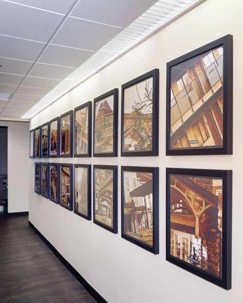 Framed photos of their properties at the NHS Corporate Office #customart #corporateart #kahlerphoto kahler photo, corporate art, custom art Office Photo Display, Corporate Office Wall Art, Photo Wall Design, Lobby Designs, Photo Display Board, Corporate Signage, Office Wall Graphics, Small Office Design Interior, Startup Office