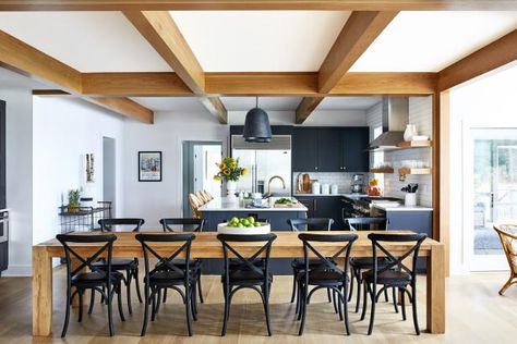 HGTV.com shares a bright space that features a large wood dining table, exposed wood beams and a kitchen that's filled with modern black cabinets and a subway tile backsplash. Large Lake House, Modern Farmhouse Dining Room, Lake Houses Exterior, Shiplap Accent Wall, Modern Farmhouse Dining, Country Dining, Rustic Dining Room, Eastern Shore, Exposed Wood