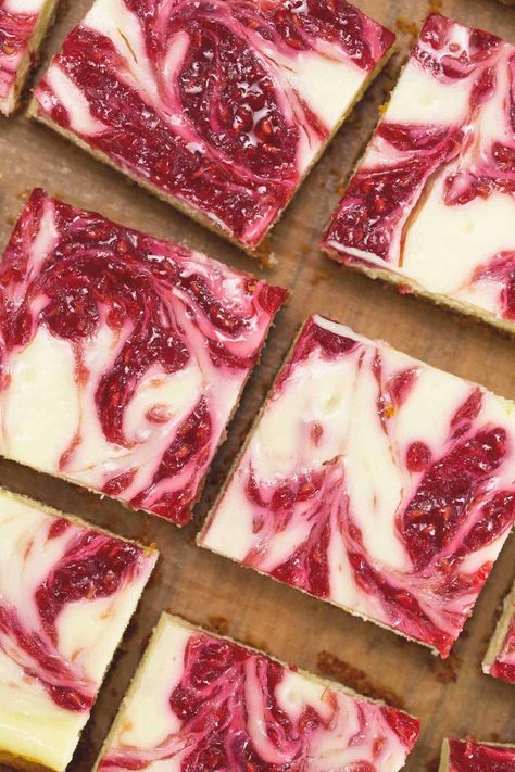 Cheesecake Bars with Raspberry Swirl - Recipes by Nora Easy Cranberry Cheesecake, Strawberry Jam Cheesecake, Jam Cheesecake, Pumpkin Pie Cheesecake Dip, Raspberry Swirl Cheesecake, Raspberry Cheesecake Bars, Cranberry Cheesecake, Cheesecake Squares, Frozen Cheesecake