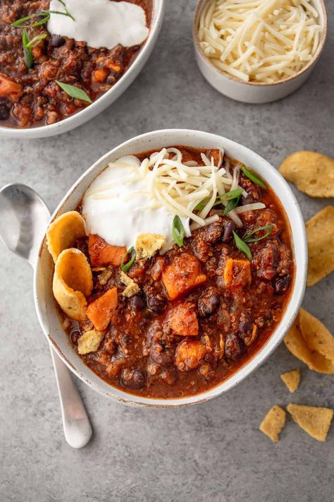 Slow Cooker Turkey Chili is a hearty, healthy bowl of goodness that cooks in the slow cooker all day long and is a guaranteed weeknight dinner winner. #chili #slowcooker #turkeyrecipe #healthyrecipe #weeknightmeal #dinnertonight #easyrecipe Quinoa Chili Recipe, Chili Dinner, Chili Recipe Healthy, Slow Cooker Turkey Chili, Hash Recipe, Slow Cooker Turkey, Sweet Potato Chili, Turkey Chili, Healthy Bowls