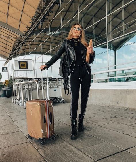 Travel in Style. An easy, all-black outfit - combat boots, comfy joggers, a cozy turtleneck, and a leather moto jacket. These simple pieces make a chic and relaxed look that’s perfect for any of your upcoming travels. #airportstyle #travelstyle #traveloutfit #wintertraveloutfit Travel Style Airport, Chic Airport Outfit, Combat Boot Outfits, Flight Outfit, Airport Outfits, Winter Travel Outfit, Outfits Chic, Combat Boot, All Black Outfit