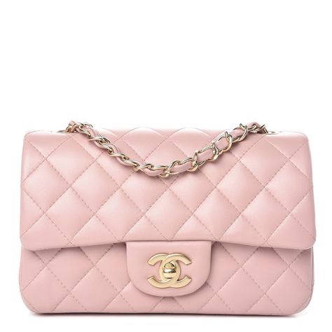 This is an authentic CHANEL Lambskin Quilted Mini Rectangular Flap in Light Pink. The chic little cross body classic mini flap is featured in soft lambskin diamond quilted light pink leather. This flap features matte gold chain leather threaded shoulder strap and a matte gold Chanel CC turn lock. This opens to a matte pink leather interior with a zipper and patched pockets. This cross-body is ideal for daytime and evening essentials with the timeless style of Chanel! Chanel Mini, Gold Chanel, Matte Pink, Pink Chanel, Leather Thread, Handbag Outlet, Pink Mini, Classic Mini, Classic Flap