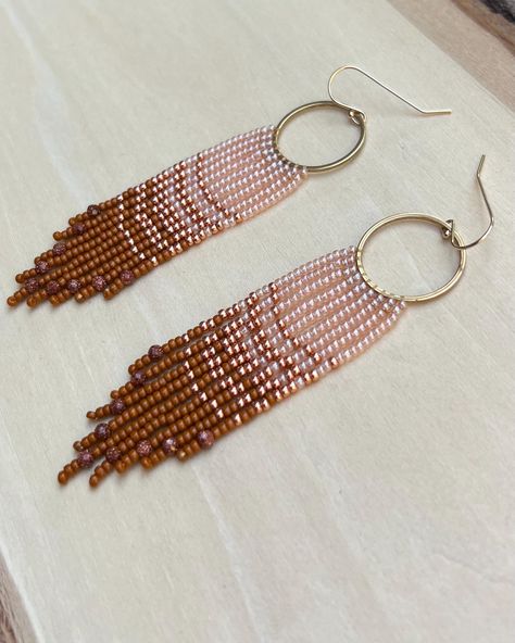 These handmade fall earrings feature a beautiful ombré pattern beginning with a peach luster, transitioning to a metallic muscat, and finishing with a rich persimmon orange accented by goldstone beads. They are made with Miyuki rocaille Japanese glass seed beads, gold stainless steel open rings, and 14Kt gold filled ear wires. As always, one-of-a-kind! Peach Lustre, Open Rings, Walnut Creek, Orange Accents, Fall Earrings, Muscat, Beaded Fringe, Glass Seed Beads, Persimmon