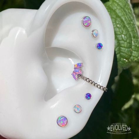 Evolved Body Art on Instagram: “Opal Titanium Curation ⁠⛓️⁠ ⁠ Opal cabochon by @neometaljewelry ⁠ Marquise fan by @industrialstrength⁠ Chain by @zadamer_jewelry” Opal Piercing Jewelry, Beautiful Piercings, Opal Piercing, Minimalist Ear Piercings, Ear Piercings Chart, Piercing Inspo, Cool Ear Piercings, Pretty Ear Piercings, Cool Piercings