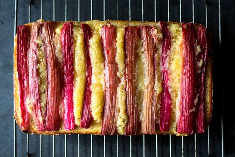 This tender poundcake has slivers of vanilla-poached rhubarb running across the top and shot through the center, adding a tangy sweetness to the buttery crumb For the most vivid stripes, use the reddest rhubarb stalks you can find They will fade to hot pink after poaching and baking Rhubarb Pound Cake, Rhubarb Cake, Cake Mug, Farro Salad, Rhubarb Recipes, Nyt Cooking, Sweet Potato Soup, Pound Cake Recipes, Brown Butter