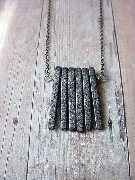 a nice string to use every day! Ceramic Jewerly, Concrete Jewelry, Industrial Jewelry, Diy Jewelry Inspiration, Spike Necklace, Hanging Jewelry, Ceramic Pendant, Ceramic Jewelry, Unisex Gifts