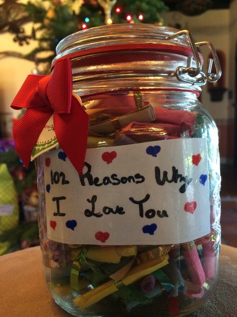 102 reasons why I love you on pieces of paper rolled up and tied with ribbon all put in a mason jar. 102 reasons, 7 number 11's all to mean 10-27-11 our anniversary date. 100 Things I Love About You Jar, I Love You Jar, Love Jar For Girlfriend, 100reasons Why I Love You Jar, Mason Jar Couple Gifts, Gift Jars, 7 Number, Reasons Why I Love You, Why I Love You