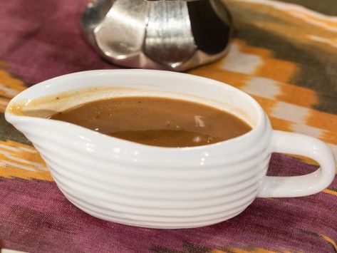 Get Make-Ahead Turkey Gravy Recipe from Food Network Make Ahead Gravy, Gravy From Drippings, Make Ahead Turkey Gravy, Turkey Gravy From Drippings, Thanksgiving Gravy, Tinctures Recipes, Turkey Gravy Recipe, Sage Recipes, Turkey Wings