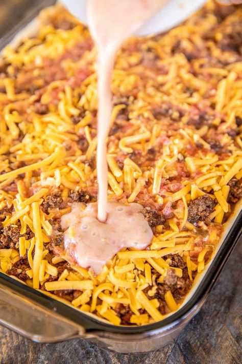 Deep Dish Taco Pie - the ultimate Mexican casserole! Taco meat, rice, corn, cheese, salsa, and eggs baked in pie crust. I mean, what's not to like?!? This makes a ton. It is perfect for a crowd. Can make the casserole in advance and refrigerate or freeze for later. We sometimes divide the recipe between two pans - bake one and freeze one for later. Top the casserole with your favorite taco toppings. Taco night never tasted so good! #taco #casserole #rice #Mexican #freezermeal Taco Pie, Corn Cheese, Mexican Casserole, Plain Chicken, Taco Casserole, Hamburger Recipes, Taco Meat, Beef Recipes Easy, Beef Dishes