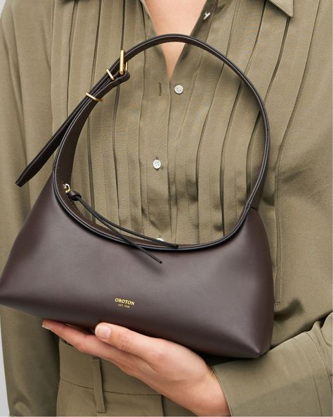 Most-loved | The Cinder Mini Baguette - Crafted from smooth leather, this modern take on a classic silhouette effortlessly transitions from day to night, perfect for any occasion.   Discover new bags in stores and online. Mini Baguette, New Bags, Cool Fits, Day To Night, To Night, Classic Silhouette, New Bag, Smooth Leather, Leather