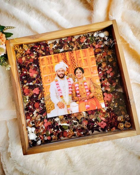 Sealing memories for lifetime ✨ My client Shridevi approached to preserve her old mala into our trending wooden frame. She wanted to have full coverage of the flowers with some highlights on it. A few red hydrangeas & gold chunks along with pearls made the entire frame turn into a beautiful piece ✨ This was her reaction on receiving the piece " woww it's beautiful.,it cameout really good " Its such a happy feeling when we get such response from clients😊 Dm to book yours now! #weddin... Gold Bokeh, Red Hydrangea, Diy Resin Art, Resin Flowers, How To Preserve Flowers, Resin Diy, Flower Frame, Resin Crafts, Resin Art