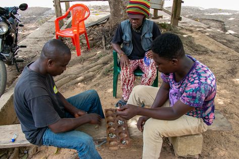 Oware is the oldest board game that is still widely played in the world today. It's several thousand years old, and Africa has always been considered its traditional home. Today, you can even play Oware on your smartphone. However, nothing beats playing in the streets of Africa with a noisy crowd participating in the game. Do you want to try it? Come to Africa! #oware #awale #boardgames #africangames #africanculture #mancala Kanye West Style, Old Board Games, Kim Kardashian And Kanye, African People, Traditional Home, African Culture, Traditional House, Kanye West, The Streets