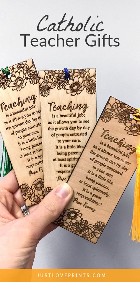 This laser engraved wooden bookmark  would make a great Catholic Teacher gift. It fits perfectly inside the pages of your favorite book, Bible, or teacher manual. You can even choose your tassel color to match your school color! Teacher Meeting, Inexpensive Party Favors, Catholic Classroom, Diy Hand Soap, Diy Teacher Christmas Gifts, Cheap Teacher Gifts, Teacher Gift Baskets, Ideas Regalos, Education Week