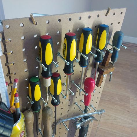 DIY Portable Tool Carrier = pegboard, with a handle,  opens up at workstation and stands up. Portable Workstation, Bamboo Chopping Board, Pvc Tube, Precision Tools, Sanding Block, Folding Furniture, Old Computers, Electrical Tape, Foot Stool