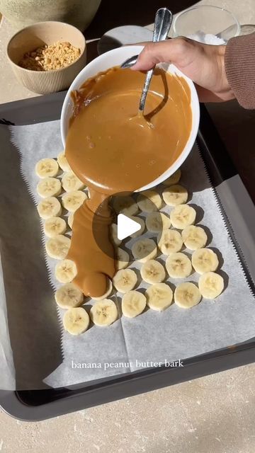 Laura Lee on Instagram: "banana peanut butter bark 🥜🍫 such a yummy treat i used slightly too much peanut butter but it turned out so good either way. thank you @lindsay.keosayian for the inspo  ingredients: bananas, peanut butter, chocolate, chopped peanuts, and salt flakes" Peanut Butter Wrap Ideas, Peanut Butter And Banana Snacks, Banana Bark Recipe, Ways To Use Peanut Butter, Peanut Butter Party Theme, Ways To Eat Peanut Butter, Peanut Butter Banana Roll Up, Banana And Peanut Butter Snack, Banana Roll Ups Peanut Butter