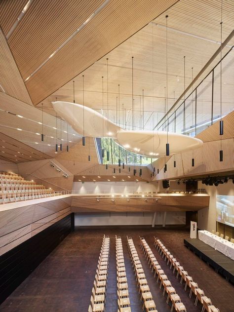 Studio Seilern Architects raises the roof of Andermatt Concert Hall Concert Hall Design, Theatre Ideas, Concert Hall Architecture, Multipurpose Hall, Andermatt, Timber Ceiling, Lectures Hall, Theatre Design, Hall Design