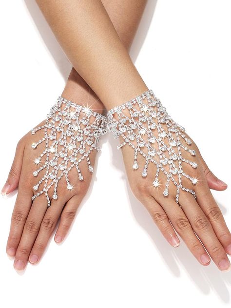 PRICES MAY VARY. Silver metal gloves feature sparkling rhinestone, making your attire more charming and fashionable. Sparkle gloves are suitable for most girls and women. Their fabric fits very well, and the lace shows the curves of your hands, making you more attractive. Rhinestone gloves with fashion style and rhinestones design, look very elegant and refined, make you more attractive in the eyes of others. Nightclub jewelry gloves can be used for masquerade parties, Halloween parties, theme p Sparkle Gloves, Rhinestone Gloves, Hand Chain Jewelry, Hand Chain, Chain Jewelry, Party Accessories, Jewelry Party, Accessories For Women, Fingerless Gloves