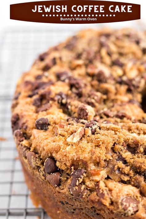 Jewish Coffee Cake cooling on a wire rack. Jewish Coffee Cake Recipe Sour Cream, Jewish Apple Cake Recipe Bundt, Jewish Coffee Cake Recipe, Jewish Coffee Cake, Jewish Apple Cake Recipe, Jewish Apple Cake, Jewish Desserts, Baked Items, Coffee Cake Recipes Easy