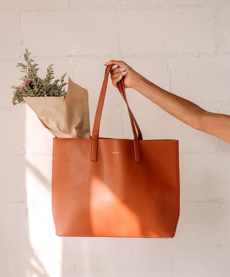 Your Next It Bag May Be Made Out Of Apple Leather #refinery29 https://www.refinery29.com/en-ca/interview-samara-handbags Leather Bag Product Photography, Handbag Shoot Ideas, Product Photography Ideas Bags, Bags Shoot, Shooting Bags, Apple Leather, Photography Bags, Vegan Handbags, Clothing Photography