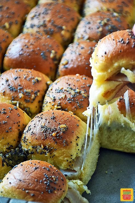 Cheesy baked Turkey Sliders perfect for a hungry party crowd, a quick weeknight dinner, & makes a great pot luck dish! Finger food like these cheesy turkey sliders are so Quick & EASY to make and everyone LOVES to eat them! These turkey and cheese pull apart sliders are topped with a buttery mustard glaze & baked until toasty. Try them at your next party or surprise the family for a fun dinner! #SundaySupper #SliderRecipes #PullApartSliders #EasyFootballFood #AppetizerRecipes #FingerFood Easy Turkey Sliders, Turkey Sliders On Hawaiian Rolls, Finger Food Menu, Pull Apart Sliders, Sliders Recipes Turkey, Sliders On Hawaiian Rolls, Cheesy Turkey, Caprese Salad Skewers, Cheese Pull Apart