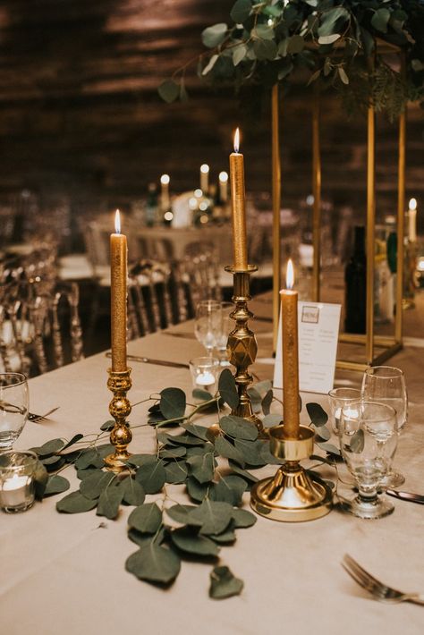 Winter Urban Fairytale Wedding - West Coast Weddings PHOTOGRAPHY: White Canvas Photo GOWN: Maggie Sottero FLORAL: Laura Kalcsa of West Coast Wedding Florals MUA/HAIR: Jennifer Brown #winterwedding #winterweddinginspo #weddingdayinspo #urbanwedding #romanticwedding #elegantbride #bridal #bride #bridalflorals #weddingflorals #floralinspiration #bridalbouquet #largebridalbouquet #vintageluxury #luxurywedding #vintagechic goldtapered goldcandles #taperedcandles #tablescape #greenery #weddingdecor Forest Green Cream Gold Wedding, Emerald And Gold Winter Wedding, Modern Fairytale Wedding Theme, Brown Green And Gold Wedding, Fall Wedding Green And Gold, Green And Brass Wedding, Antique Gold Wedding Decor, Vintage Gold Wedding Decor, Dark Green Black And Gold Wedding