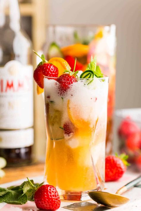 Transform a classic summertime cocktail into an even more refreshing and boozy treat with this Pimm's Cup Float! It's just like a classic Pimm's cup with a scoop or two of lemon sorbet! Pimms Recipe, Pimms And Lemonade, Pimm's Cup, Sliced Orange, Pimms Cup, Summertime Cocktail, Sliced Cucumber, Ice Making, Lemon Sorbet