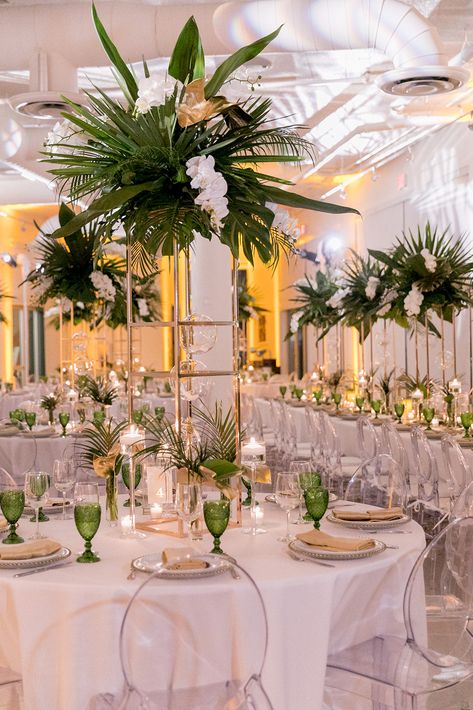 Orchid And Palm Centerpiece, African Wedding Centerpieces, Tropical Tent Wedding, Emerald Green Tropical Wedding, Forest Green Beach Wedding, Elegant Tropical Wedding Decor, Tropical Event Decor, Formal Tropical Wedding, Tropical Greenery Centerpieces