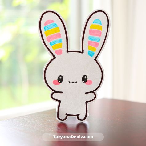 How to draw kawaii Easter bunny step-by-step (with video), and how to create a paper craft project to decorate your home for Easter. Great for drawing with kids, Easter holiday DIY decorations, staying home and kids activities. Kawaii art and tutorial by Tatyana Deniz ©TatyanaDeniz.com #kawaiianimals #howtodraw #papercrafts #kidsactivities #tatyanadeniz Kawaii Easter Drawing, Easter Kawaii, Easter Drawing, Kawaii Easter, Draw Kawaii, Bunny Sketches, Easter Paper Crafts, Easter Drawings, Bunny Painting