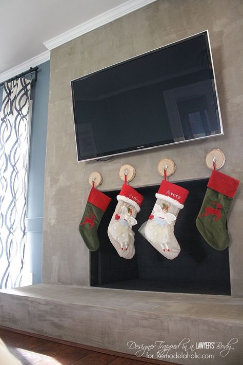 Hanging stockings without a mantel can be done! Come learn how with this tutorial by Designer Trapped in a Lawyer's Body featured on Remodelaholic. #Remodelaholic #christmasstockings #howtohangstockings Stockings No Mantle Fireplace, Christmas Fireplace Mantels, Fireplace Stockings, Hanging Christmas Stockings, Christmas In Italy, Christmas Stocking Hangers, Christmas Tree With Presents, Vintage Christmas Stockings, Christmas Fireplace Decor