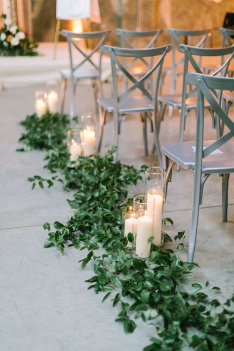 Fall Wedding With Greenery, Chapel Isle Decorations, Wedding Aisle Greenery And Candles, Isle Greenery Wedding, How To Decorate Pillars For Wedding, How To Decorate Isle For Wedding, Greenery Aisle Wedding, Greenery Down The Aisle, Outdoor Chapel Wedding Decorations