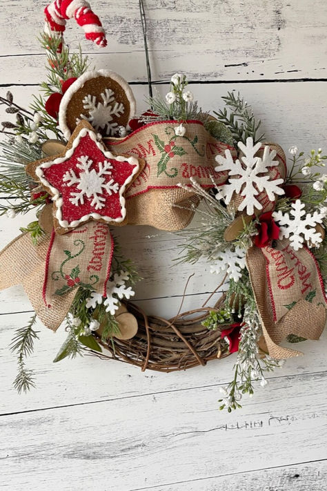 Candy canes and snowflakes in a grapevine Christmas wreath for your seasoanl home decor with burlap ribbon and faux evergreens Christmas Snowflakes Wreath, Christmas Table Top Decorations, Seasonal Wall Hangings, Merry Christmas Decor, Grapevine Christmas, Holiday Floral Arrangements, Merry Christmas Snowflakes, Christmas Wired Ribbon, Snowflake Wreath