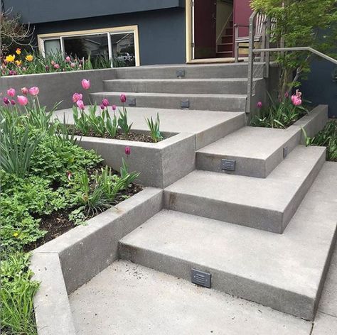 Concrete Patio Stairs Ideas, Modern Concrete Steps Entrance, Modern Front Porch Steps, Cement Steps Backyard, Cement Entryway Front Porches, Exterior Steps With Landing, Concrete Stoop Ideas, Concrete Steps On Hillside Sloped Yard, Modern Concrete Steps