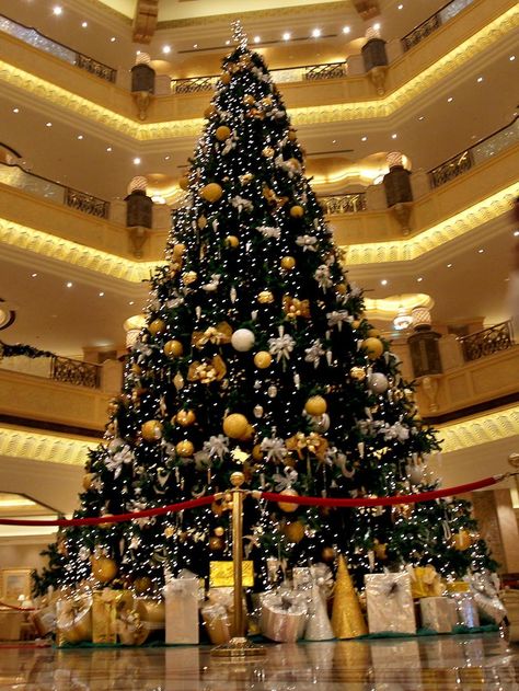 $11,000,000 bejewelled tree on display last year at the Emirates Palace Hotel in Abu Dhabi. Amazing Christmas Trees, Luxury Christmas Tree, Creative Christmas Trees, Real Christmas Tree, Ribbon On Christmas Tree, Beautiful Christmas Trees, Christmas Tree Design, Christmas Tree With Gifts, Noel Christmas