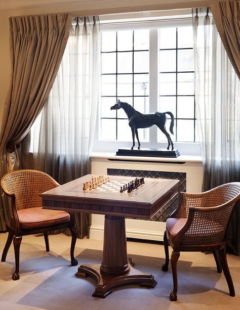 Chess Inspired Furniture, Chess Table In Library, Chess Living Room, Chess Room Ideas, Chess Board In Living Room, Chess Table Aesthetic, Chess Set Decor Living Rooms, Chess Room Design, Chess Table In Living Room