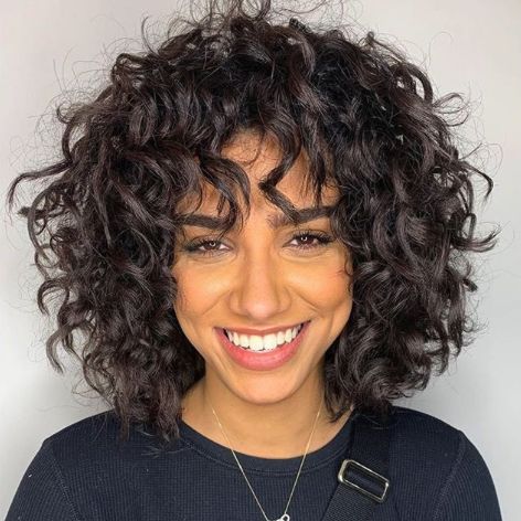 Thick Curly Hair Medium Length, Curly Shag Bob Haircut, Cute Curly Haircuts Natural Hair, Short Curly Haircuts For Long Faces, Curly Shag Haircut Round Face, Fun Haircuts For Curly Hair, Volume Curly Haircut, Curly Hair Trends 2023, Best Cut For Curly Hair