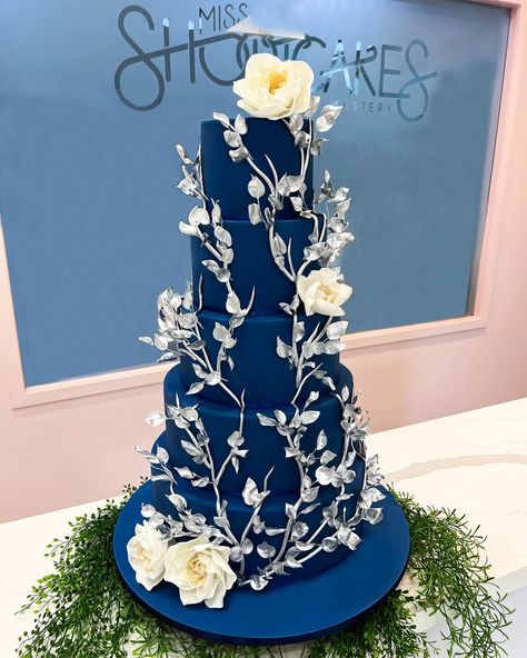 5 tiers of navy blue wedding cake with silver vines and leaves, for Aiman & Zahirah's wedding day. 👰🏻‍♀️🤵🏻 Best Wishes & May God Bless your marriage 😍 🤩 For orders and inquiries. 🌐 https://miss-shortcakes.com/ 📧 jessica.ting@miss-shortcakes.com #5tierweddingcake #bluethemeweddingcake #weddingcake #weddingcakes #cakewedding #weddingcakeideas #weddingcakedesign #elegantweddingcakes #customcakekl #cakeklang #cakeklangvalley #missshortcakes #mcitymissshortcakes Royal Blue Wedding Cake, God Bless Your Marriage, Navy Blue Wedding Cake, Navy Wedding Cake, Wedding Cake Two Tier, Royal Blue Wedding Cakes, Navy Blue Wedding Cakes, 5 Tier Wedding Cakes, Bling Wedding Cakes