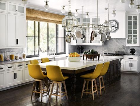 The 12 ft island has a Bleu de Savior marble top. Custom oak bar stools in sunshine yellow leather add a bright counterpoint to pendants from Charles Edward and fittings from @Wtrwrks. #interiordesign #interiordesignideas #interiordecorating #interiordecor #kitchen #kitchenideas #kitchenremodel #kitchencabinets #kitchendesign #kitchendecor #kitchendecoratingideas #kitchendesignideas #kitchenideas #beachhouse #beachhousedecor #beachaesthetic #californiabeachhouse Martyn Lawrence Bullard Design, Kardashian Home, Martyn Lawrence Bullard, Mediterranean Style Home, All White Kitchen, Perfect Kitchen, Top Interior Designers, Unique Kitchen, Eclectic Interior